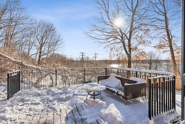 view of snow covered deck