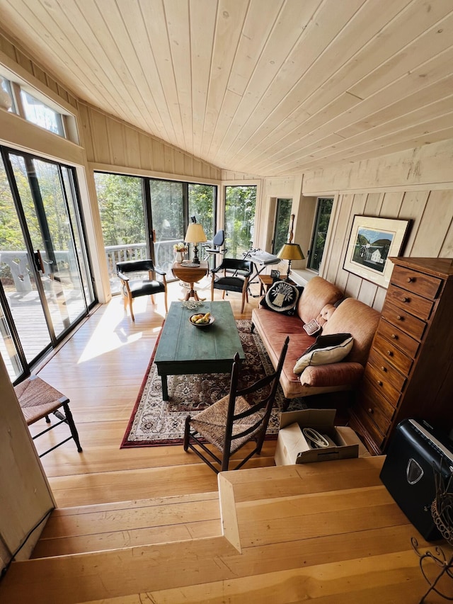 sunroom with wooden ceiling and lofted ceiling