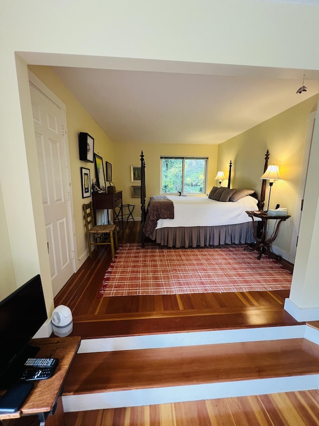 bedroom featuring hardwood / wood-style floors