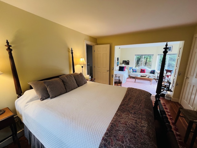 bedroom with hardwood / wood-style flooring