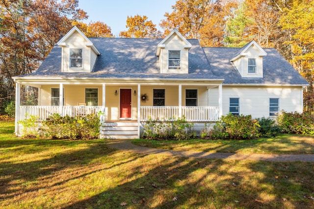 cape cod home with a porch and a front yard