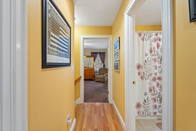 hallway featuring light hardwood / wood-style floors