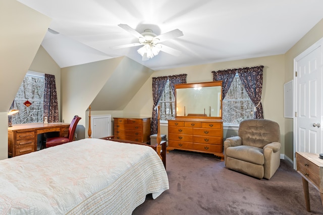 bedroom featuring lofted ceiling, dark colored carpet, and ceiling fan