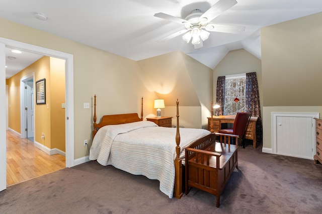 carpeted bedroom with lofted ceiling and ceiling fan