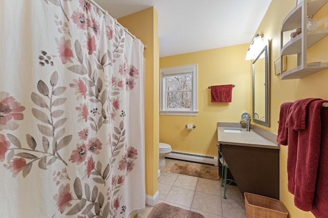 bathroom with a shower with shower curtain, toilet, tile patterned floors, a baseboard heating unit, and vanity