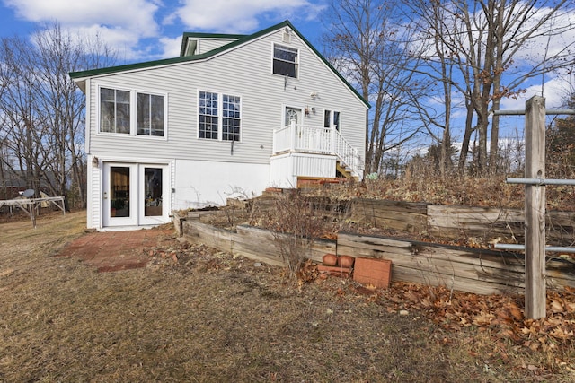 back of house featuring french doors