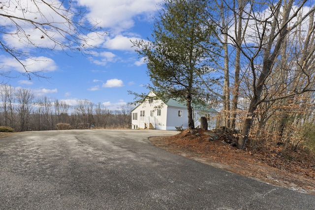 view of side of home with a garage