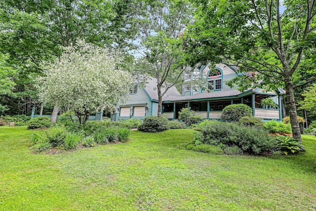 view of yard with a garage