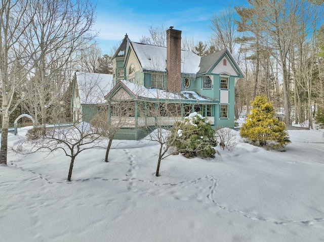 view of front of property featuring a chimney