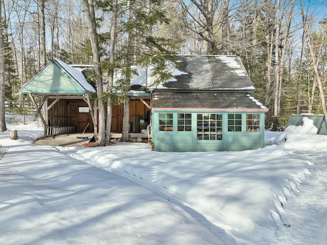 exterior space with metal roof