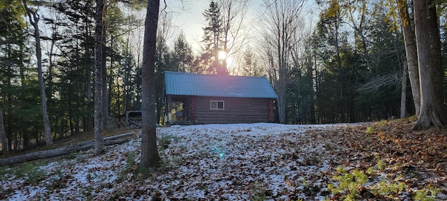 view of property exterior at dusk