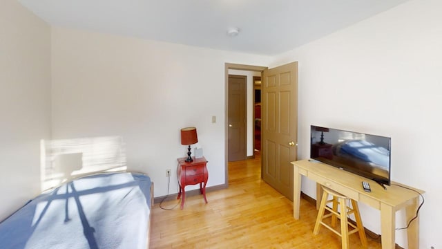 living area featuring hardwood / wood-style floors