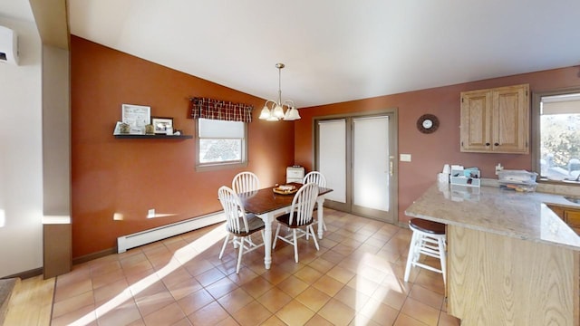 tiled dining area with a baseboard radiator, vaulted ceiling, a healthy amount of sunlight, and an inviting chandelier