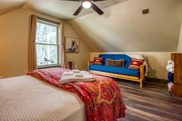 bedroom featuring ceiling fan and vaulted ceiling