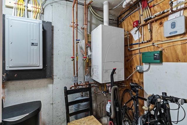 utility room with tankless water heater and electric panel