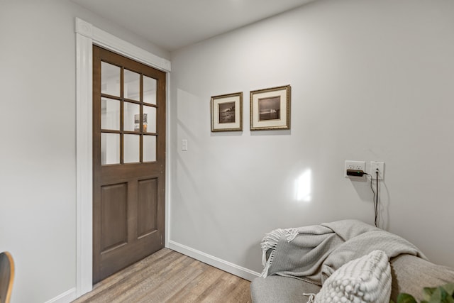 doorway to outside with light hardwood / wood-style flooring