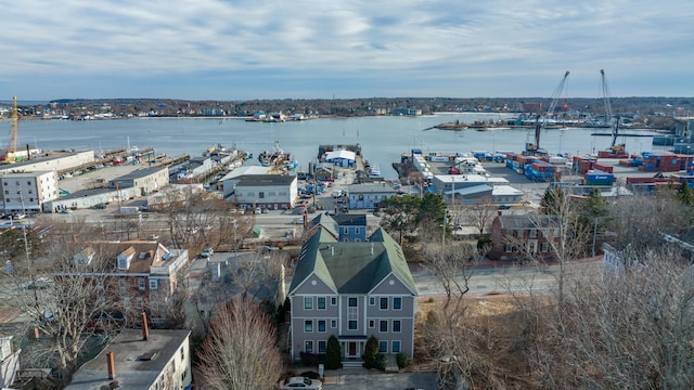 birds eye view of property featuring a water view