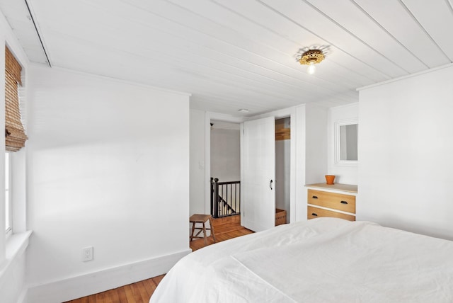 bedroom with a closet and light hardwood / wood-style flooring