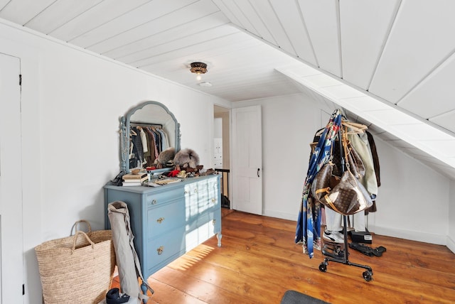 interior space with wood-type flooring and wooden ceiling