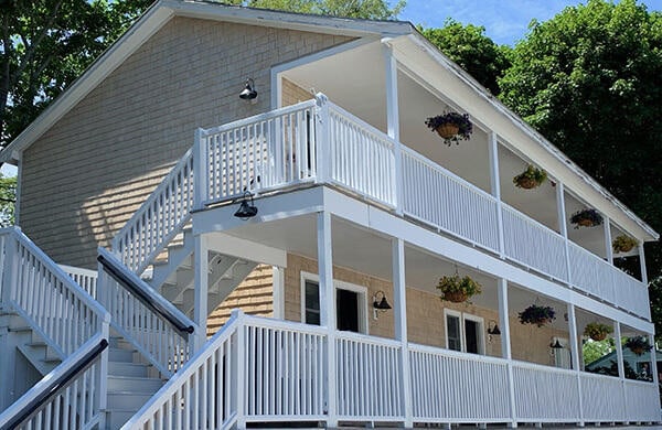 view of side of property with a balcony