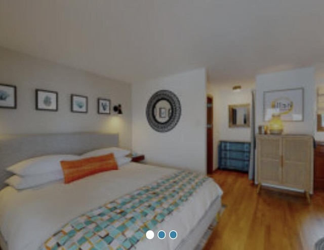 bedroom with light wood-type flooring