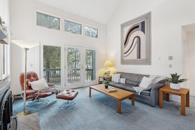 living room with carpet flooring and lofted ceiling