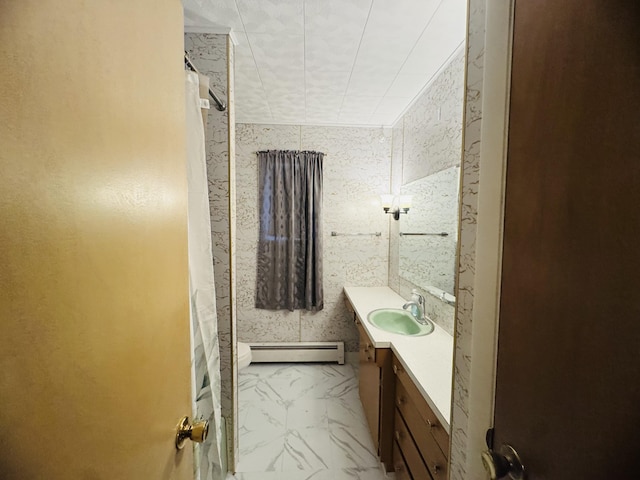 bathroom featuring curtained shower, a baseboard radiator, and vanity