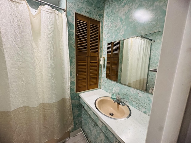 bathroom featuring sink and tile patterned flooring