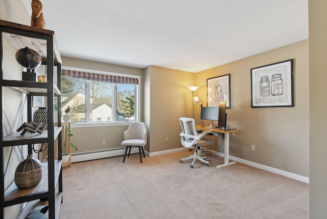 office space with light carpet and a baseboard radiator