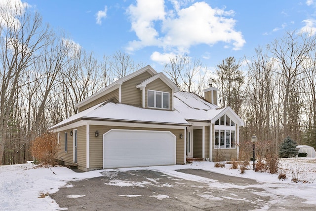 view of front of property with a garage