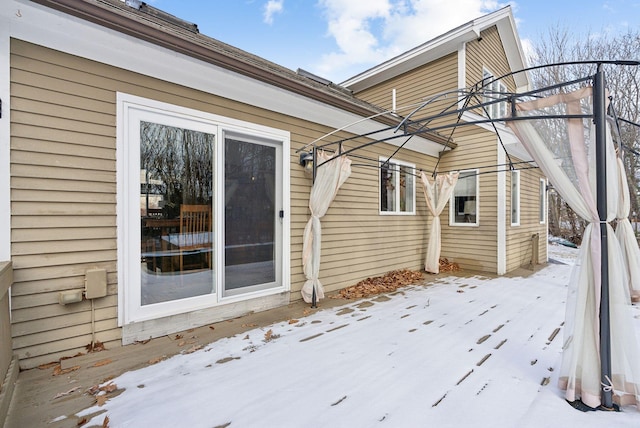 view of snow covered property