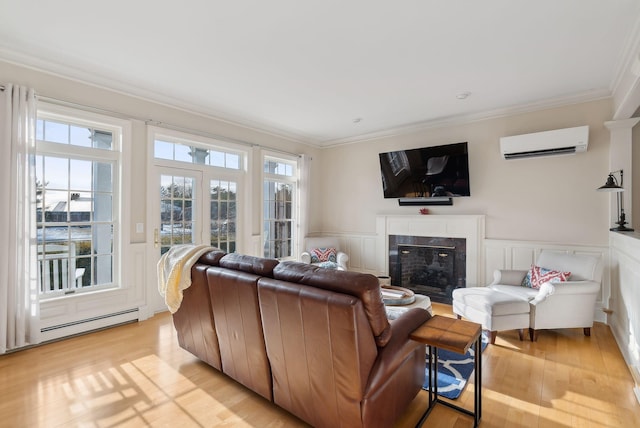 6 Ebb Tide Dr, Cumberland, ME 04110 - living room featuring baseboard heating, crown molding, a wall unit AC, and a wealth of natural light