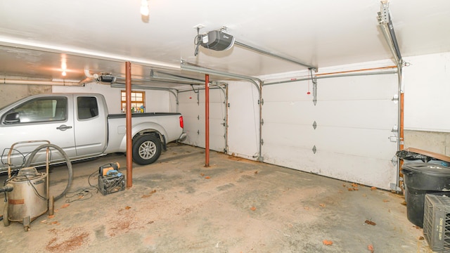 22 Jewett Rd, Raymond, ME 04071 - garage with a garage door opener