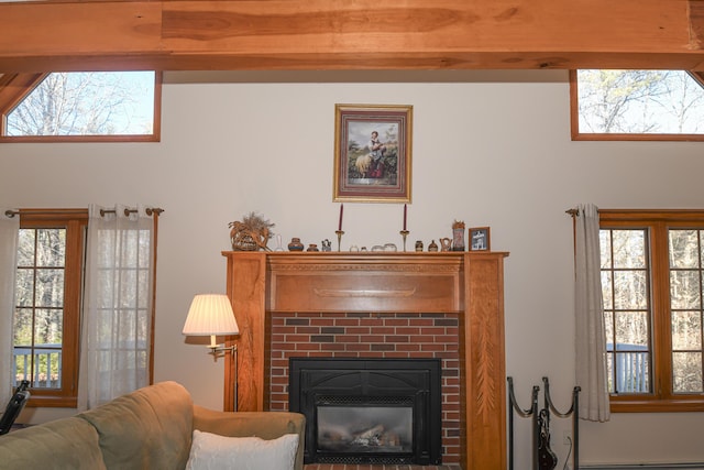 22 Jewett Rd, Raymond, ME 04071 - living room featuring a baseboard heating unit and a fireplace