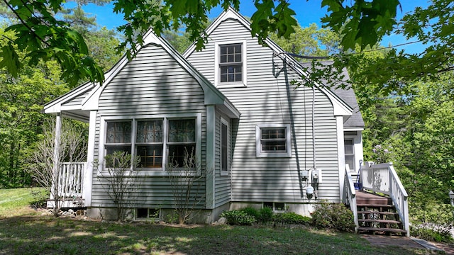 22 Jewett Rd, Raymond, ME 04071 - view of front of property featuring a deck