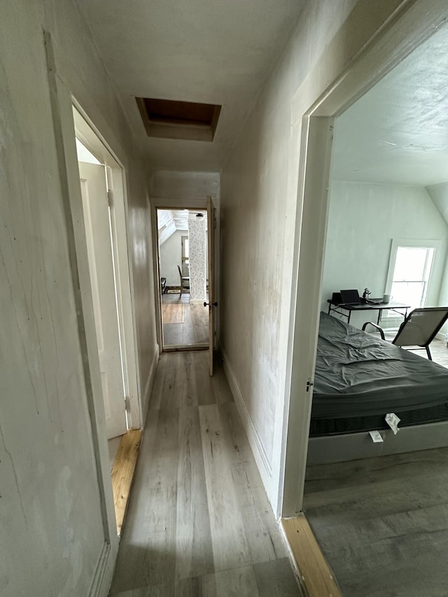 corridor featuring light wood-type flooring