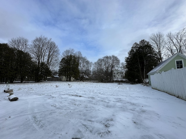 view of yard covered in snow