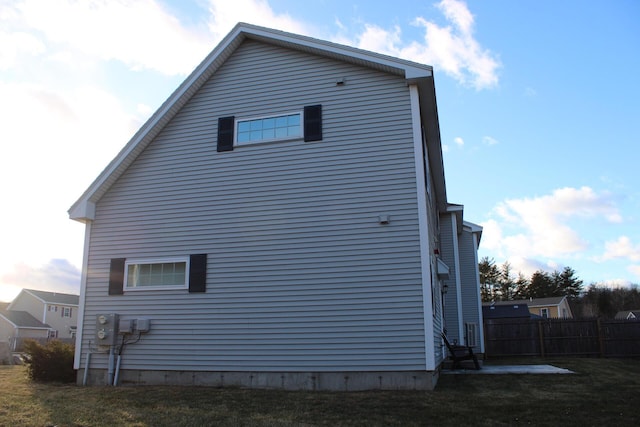 view of home's exterior featuring a lawn