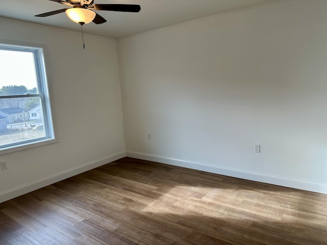 unfurnished room featuring ceiling fan and light hardwood / wood-style floors