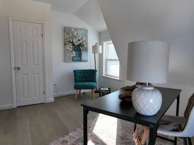 home office with hardwood / wood-style floors