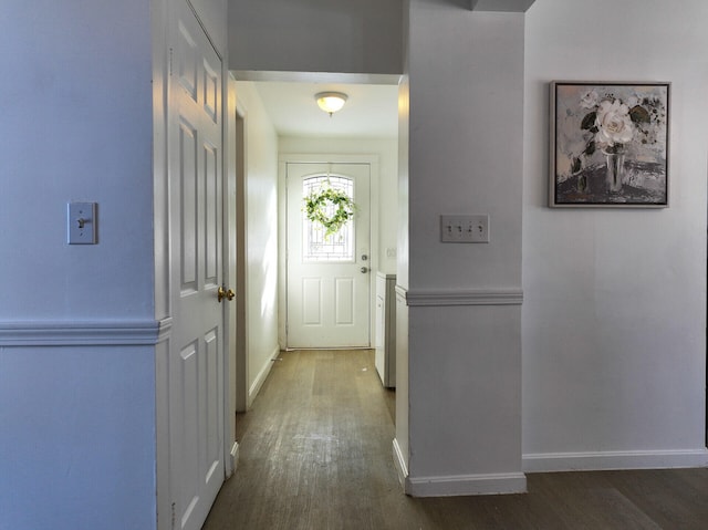 doorway featuring dark hardwood / wood-style floors