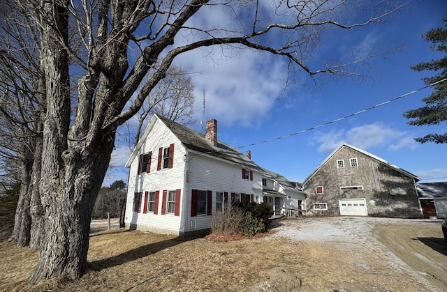 view of home's exterior with a garage