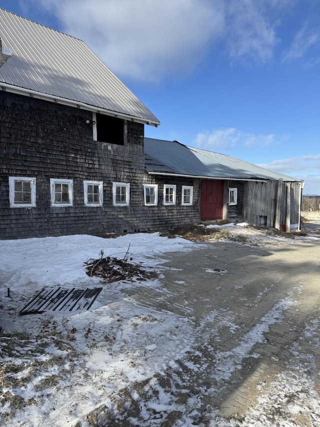 view of snow covered house