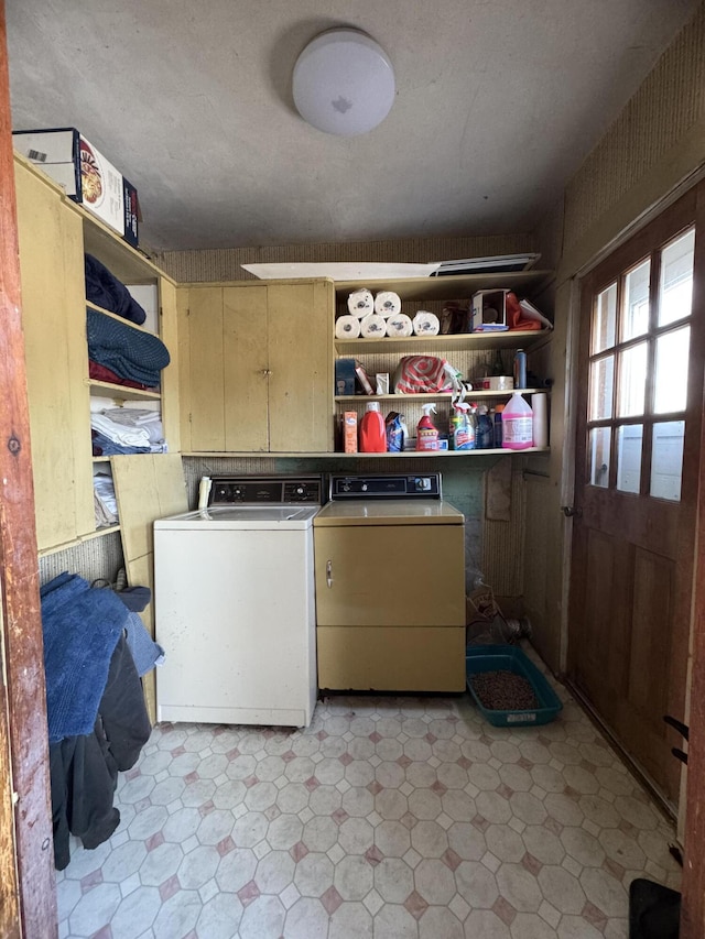 laundry room with independent washer and dryer