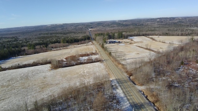 birds eye view of property featuring a rural view