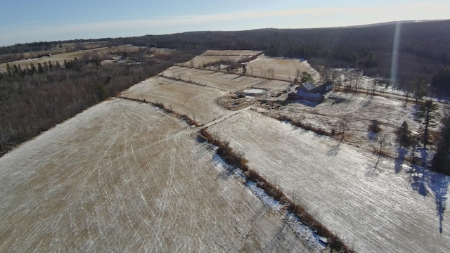 birds eye view of property with a rural view