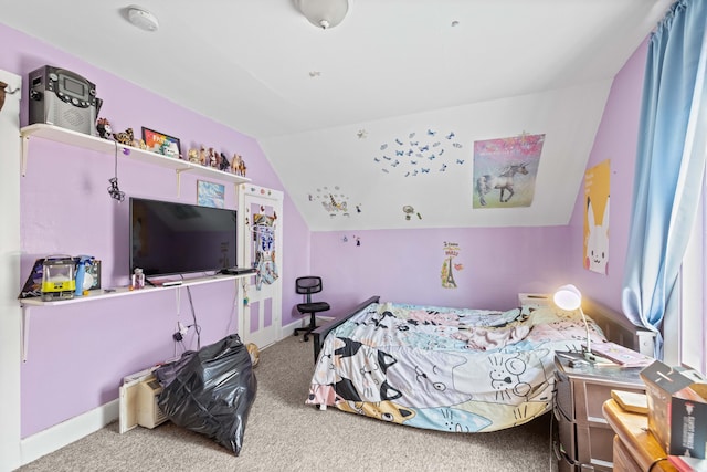 carpeted bedroom featuring vaulted ceiling