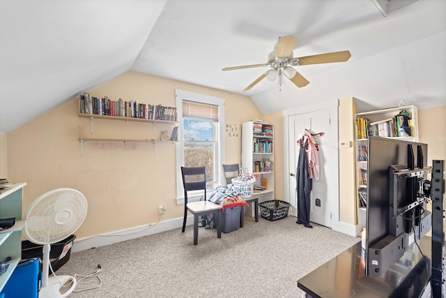 interior space featuring carpet floors, ceiling fan, and lofted ceiling