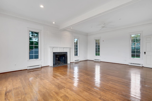 unfurnished living room with beam ceiling, ceiling fan, a fireplace, and a baseboard radiator