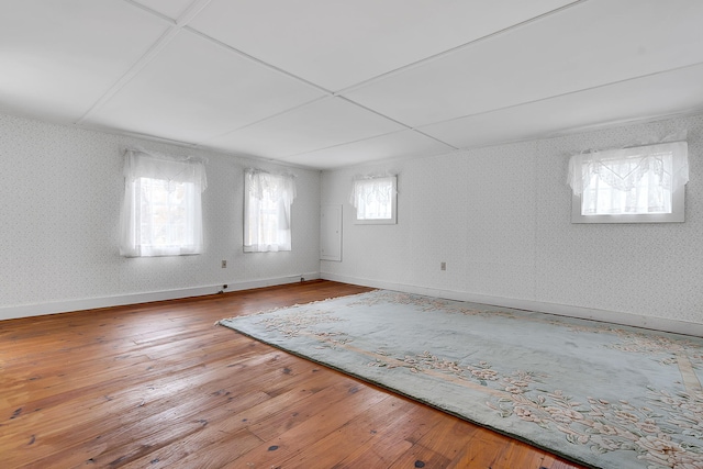 unfurnished room featuring wood-type flooring